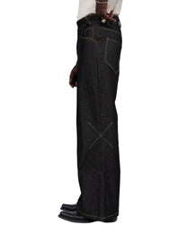 Black Raw Denim Bootcut Jeans — Roots Patwa SS26