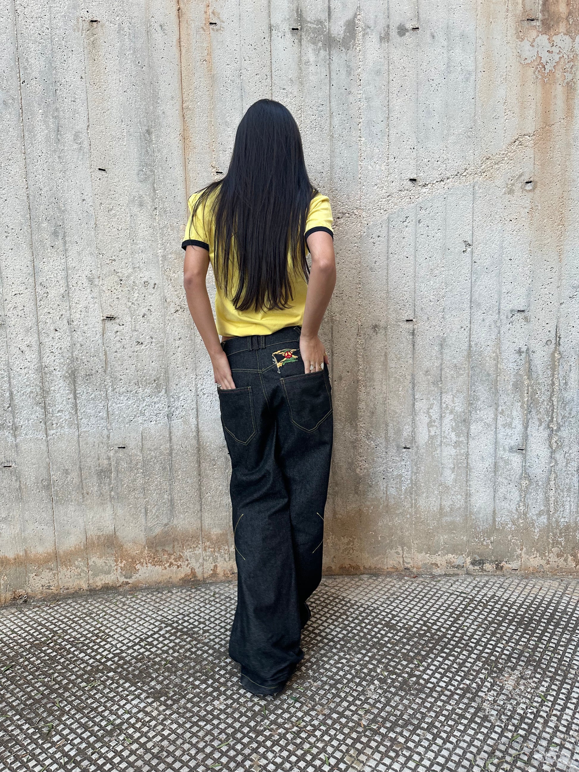 Black Raw Denim Bootcut Jeans — Roots Patwa SS26