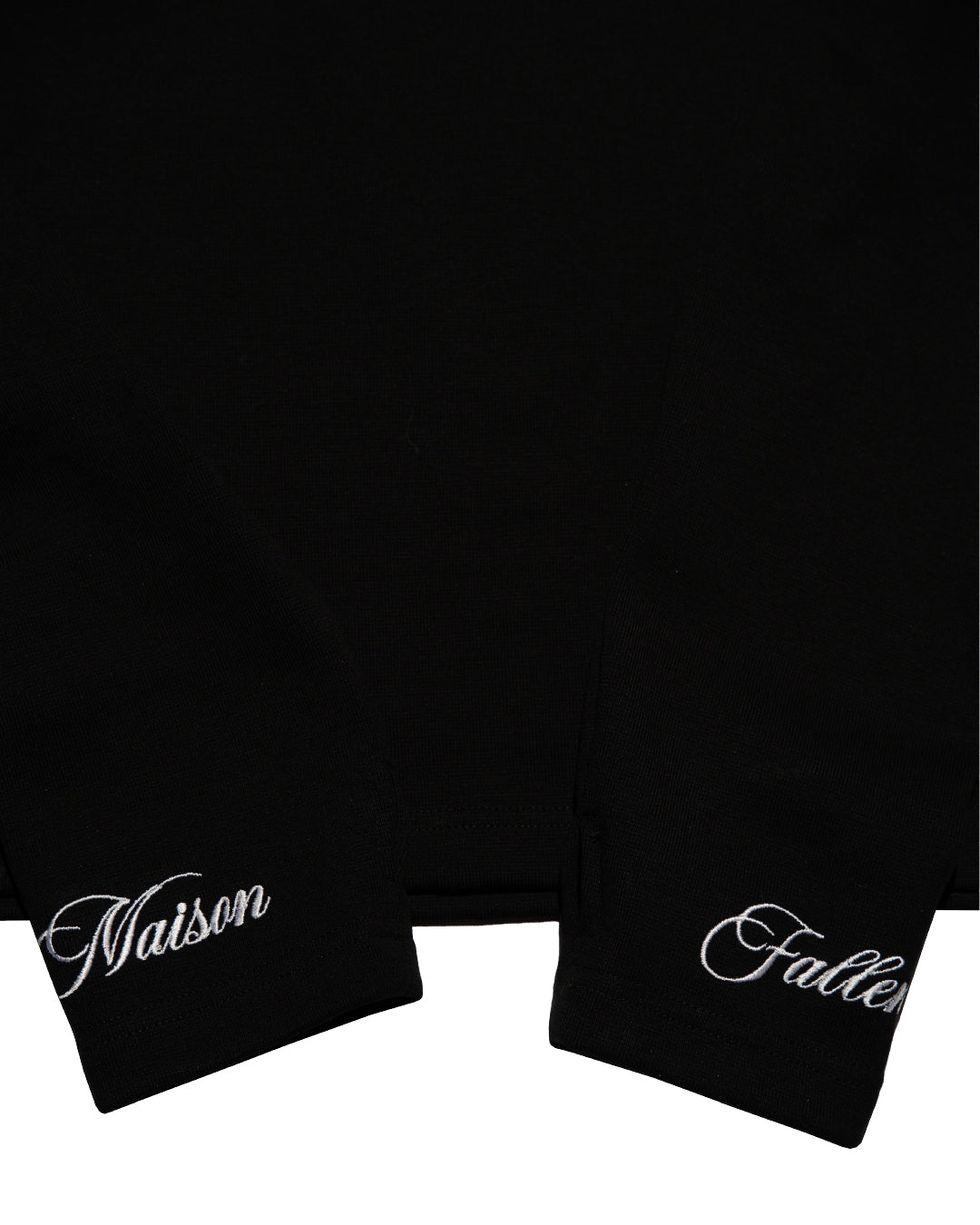 Black garment with 'Naison' and 'Falle' text on a white background
