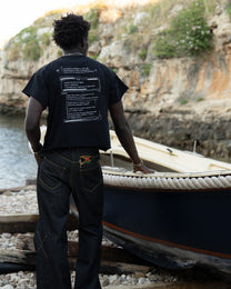 "follemente" organic cotton baby tee black — Patwa SS26