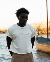 “follemente”  organic cotton baby tee white — Patwa SS26
